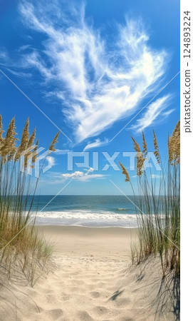 Beautiful shoreline with soft waves and vibrant clouds under a clear blue sky 124893224