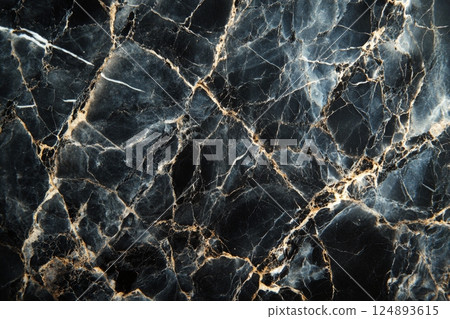 Elegant black marble with white and gold veining showcasing natural beauty and texture 124893615