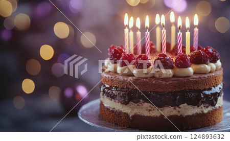 Celebratory chocolate cake with candles and decorations for a festive occasion 124893632