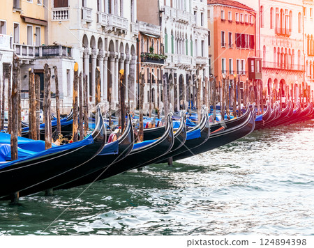 Row of Gondolas on Venice Grand Canal at Sunset 124894398