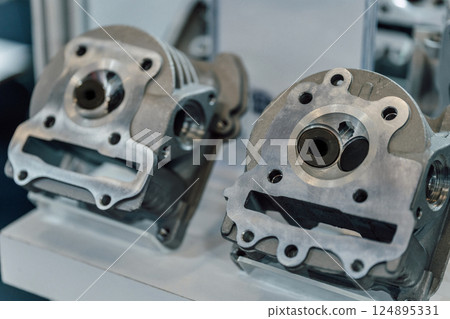 gasoline combustion chamber on a motorcycle. valve cover on a scooter 124895331