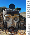 Ancient mask sculpture at Teatro Andromeda in Sicily 124895398