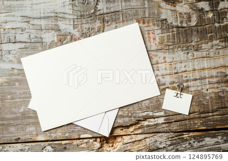 Blank Business Card on Rustic Wooden Table with Natural Decor Background 124895769