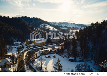 Street Passing Into The Snowy Romanian Forest Street Passing Into The Snowy Romanian Forest 124896118
