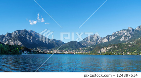 Calm Lake with Mountain and Clear Sky near Lecco, lake Como 124897614
