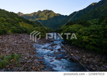 Spectacular view of the Yakushima Offshore Alps (May) Mountains and Miyanoura River at dawn 124897810