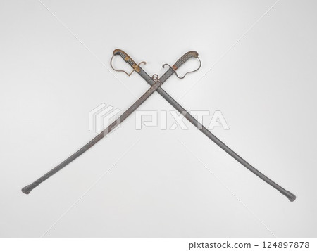 Two swords are displayed in a white background Two swords are displayed in a white background 124897878