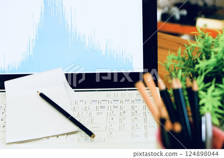 Business image graph and computer chart desk work 124898044