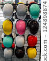motorcycle helmet on display at the market. motorcycle equipment fair 124898874