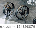 Electric motor in motorcycle wheel. without gasoline engine for scooters black 124898879