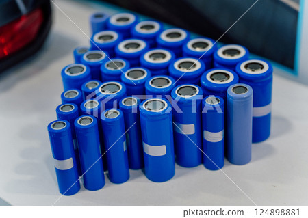 lithium ion batteries for motorcycles and cars. blue batteries for electric vehicles 124898881