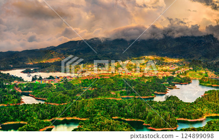Aerial view of Penol-Guatape Reservoir in Colombia with vibrant landscapes, lush green hills and a network of shimmering turquoise lakes 124899098