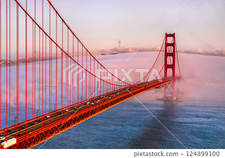Golden Gate Bridge Shrouded in Mystical Fog Overlooking the Bay in San Francisco - California, United States 124899100