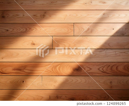 Beautiful wood grain background material with sunlight filtering through the trees 124899265
