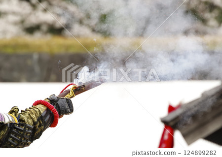 Matchlock gun firing scene Matchlock gun firing scene 124899282