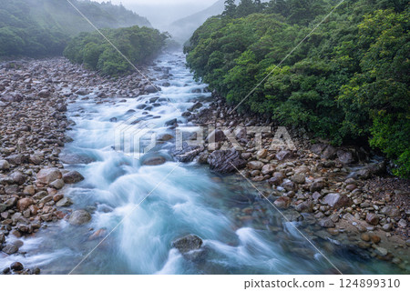 Spectacular view of the Yakushima Offshore Alps (June) Miyanoura River with swollen waters 124899310