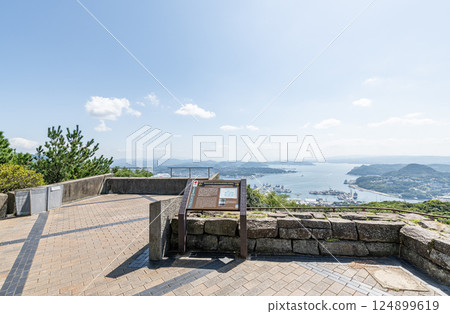 Sasebo cityscape as seen from Yumiharidake Observatory, Sasebo, Nagasaki Prefecture 124899619