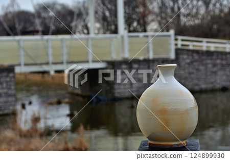 At the foot of the bridge in winter At the foot of the bridge in winter 124899930