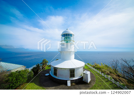Overlooking the Muroto Cape Lighthouse | A spectacular spring view against the blue sky and sea Overlooking the Muroto Cape Lighthouse | A spectacular spring view against the blue sky and sea 124902007