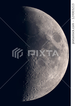 Detailed view of waxing gibbous moon showing cratered surface. 124903213