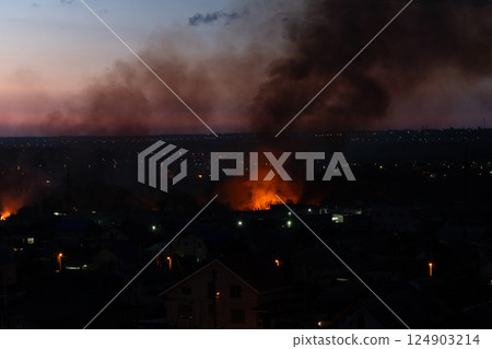 Intense fire erupts in residential district during early evening 124903214