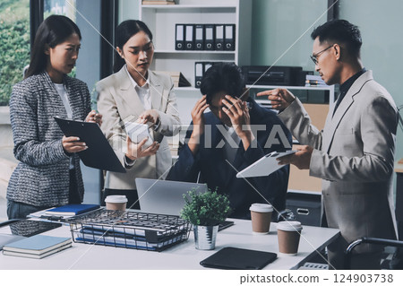 Large group of worried business people having a meeting. Large group of worried business people having a meeting. 124903738