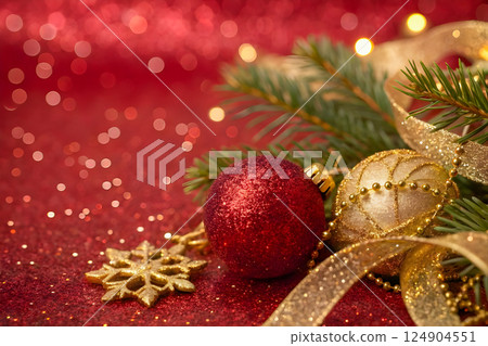 golden christmas ball on snow background golden christmas ball on snow background 124904551