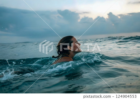 beautiful young woman in bikini on the beach 124904553