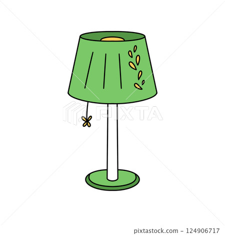 A green lamp with a yellow shade and a leaf design 124906717