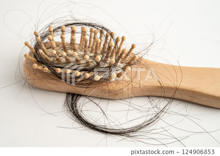 Hair loss fall with comb bush serious problem health, beauty and cosmetic. Hair loss fall with comb bush serious problem health, beauty and cosmetic. 124906853