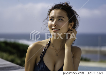 Beach woman image 124907421