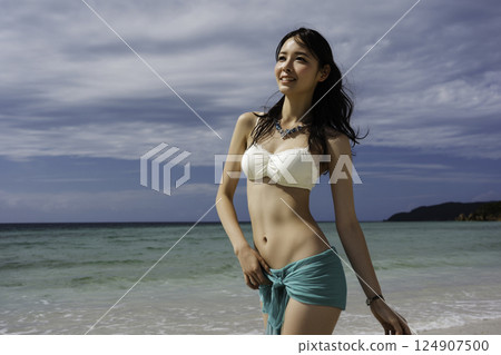 Beach woman image 124907500