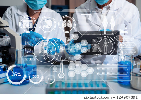 Scientist in laboratory study and analyze scientific sample. Scientist in laboratory study and analyze scientific sample. 124907891