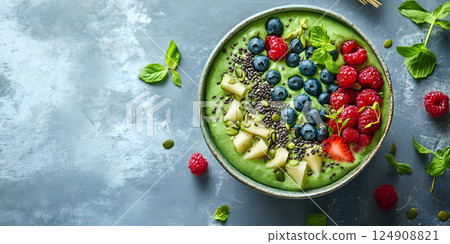 Green smoothie bowl with fresh berries 124908821
