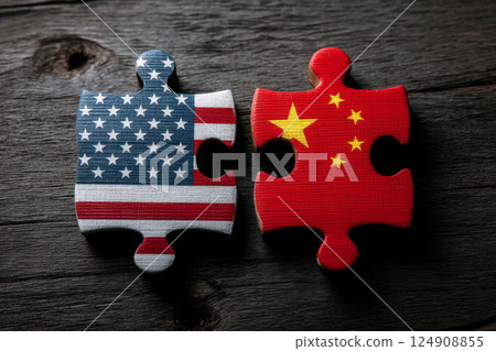 USA and China puzzle pieces on wooden background, Political conflict concept 124908855