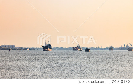 Panorama view of ocean liner, Cargo Ship, Thanker going to port in Thai gulf zone near Samutprakarn province, Thailand. Panorama view of ocean liner, Cargo Ship, Thanker going to port in Thai gulf zone near Samutprakarn province, Thailand. 124910120