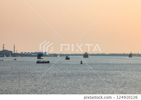 Panorama view of ocean liner, Cargo Ship, Thanker going to port in Thai gulf zone near Samutprakarn province, Thailand. Panorama view of ocean liner, Cargo Ship, Thanker going to port in Thai gulf zone near Samutprakarn province, Thailand. 124910126