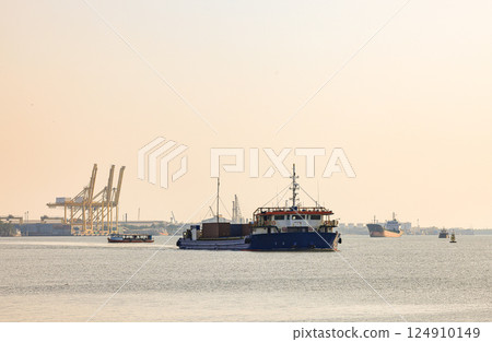ocean liner, Cargo Ship, Thanker going to port in thai gulf zone near samutprakarn province, Thailand. ocean liner, Cargo Ship, Thanker going to port in thai gulf zone near samutprakarn province, Thailand. 124910149