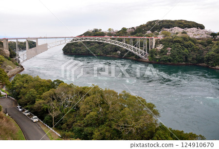 Cherry blossoms, the Nishikai Bridge, and the whirlpools of Inoura Strait 124910670