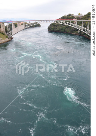 Cherry blossoms, the Nishikai Bridge, and the whirlpools of Inoura Strait 124910674