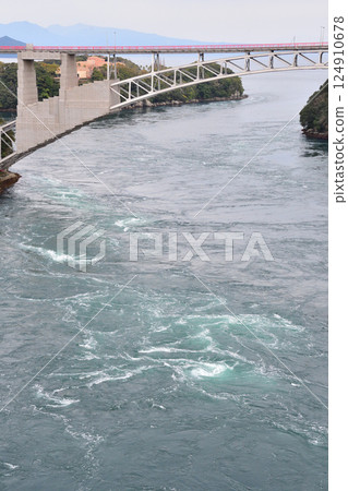 Cherry blossoms, the Nishikai Bridge, and the whirlpools of Inoura Strait 124910678