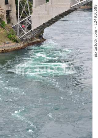 Cherry blossoms, the Nishikai Bridge, and the whirlpools of Inoura Strait 124910689