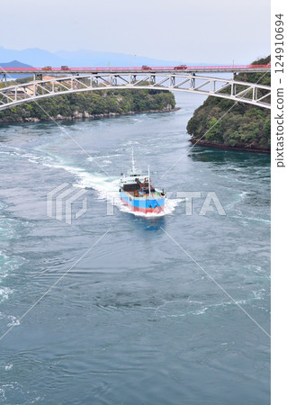 Cherry blossoms, the Nishikai Bridge, and the whirlpools of Inoura Strait 124910694