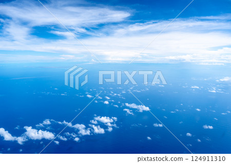 Aerial view of the Tuamotus atoll in French Polynesia with clouds Aerial view of the Tuamotus atoll in French Polynesia with clouds 124911310