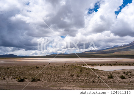 Vast valley and mountains landscape with dramatic sky, Peru 124911315