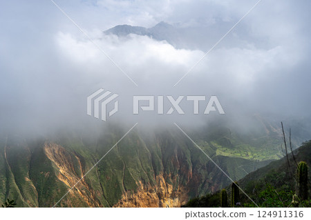 Colca Canyon in the mist and clouds, Peru 124911316