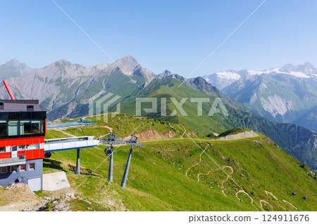 Scenic panorama alpine ski lift gondola landscape view Kals Grossglockner valley Tyrol mountains nature background. Panoramic view Alps summer hiking trail adventure tourism recreational area Scenic panorama alpine ski lift gondola landscape view Kals Grossglockner valley Tyrol mountains nature background. Panoramic view Alps summer hiking trail adventure tourism recreational area 124911676