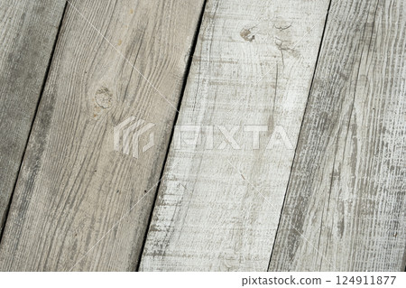 Texture of wooden gray planks close-up Texture of wooden gray planks close-up 124911877
