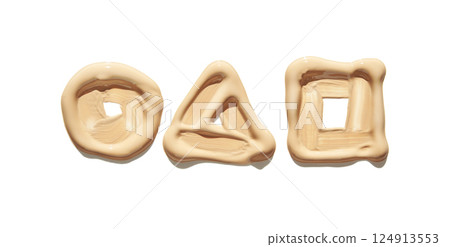 Creamy makeup swatch of circle, triangle, and square shapes in light beige color 124913553