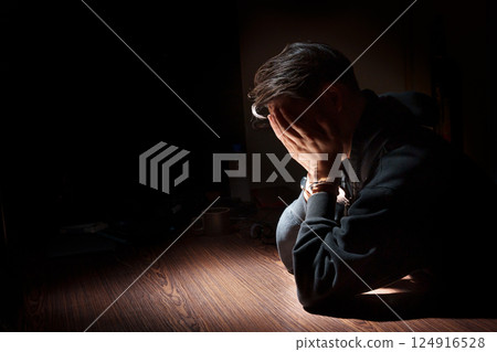 A depressed man 124916528